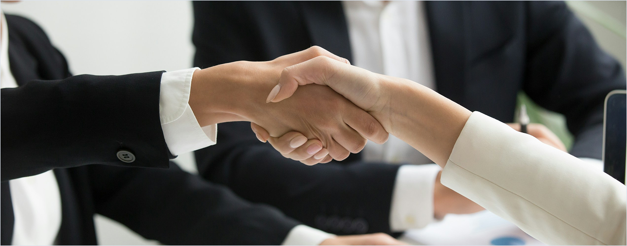 Corporate high level handshake partnership sign off agreement